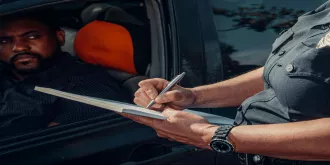 police officer writing a ticket